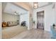 Bright and spacious entryway with tile floors and a view into the living room at 15207 S 183Rd Ave, Goodyear, AZ 85338