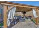 Covered patio gazebo with comfortable seating and string lights at 15207 S 183Rd Ave, Goodyear, AZ 85338