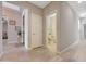 Clean and spacious hallway with a powder room at 15207 S 183Rd Ave, Goodyear, AZ 85338