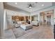 Open living room with a view of kitchen and entryway at 15207 S 183Rd Ave, Goodyear, AZ 85338