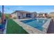 Spacious backyard with a refreshing pool and patio area at 15207 S 183Rd Ave, Goodyear, AZ 85338