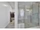 Spacious walk-in shower with glass enclosure and built-in seat at 15207 S 183Rd Ave, Goodyear, AZ 85338