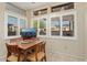 Breakfast nook with a table and four chairs by a window at 15820 W Falcon Ridge Dr, Sun City West, AZ 85375