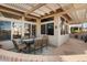 Relaxing covered patio with seating area, perfect for outdoor dining at 15820 W Falcon Ridge Dr, Sun City West, AZ 85375