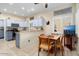 Kitchen with granite countertops and blue cabinets at 15820 W Falcon Ridge Dr, Sun City West, AZ 85375