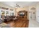 Living room with hardwood floors and built-in entertainment center at 15820 W Falcon Ridge Dr, Sun City West, AZ 85375