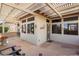 Covered patio with stone flooring, and a pergola at 15820 W Falcon Ridge Dr, Sun City West, AZ 85375