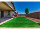 Artificial turf backyard with covered patio at 16019 W Avenida Del Sol --, Surprise, AZ 85387