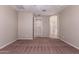 Spacious bedroom with ensuite bathroom access and neutral color palette at 16019 W Avenida Del Sol --, Surprise, AZ 85387