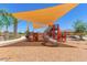 Playground with large tube slide and shade structure at 16019 W Avenida Del Sol --, Surprise, AZ 85387