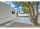 Backyard view with patio, gravel and trees at 17030 E Calaveras Ave, Fountain Hills, AZ 85268