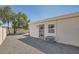 Backyard with gravel, shed, and a side of the house at 17030 E Calaveras Ave, Fountain Hills, AZ 85268