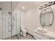 Modern bathroom with glass shower and white vanity at 17030 E Calaveras Ave, Fountain Hills, AZ 85268