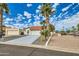 Single-story home with red tile roof and driveway at 17030 E Calaveras Ave, Fountain Hills, AZ 85268