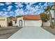 Single story home with tile roof, attached garage, and desert landscaping at 17030 E Calaveras Ave, Fountain Hills, AZ 85268