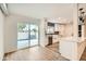 Modern kitchen with white cabinets, quartz countertops and view to backyard at 17030 E Calaveras Ave, Fountain Hills, AZ 85268