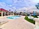 Community pool with lounge chairs and patio tables at 17030 E Calaveras Ave, Fountain Hills, AZ 85268