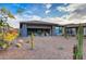 Desert backyard with gravel landscape and desert flora under a gorgeous blue sky at 17527 E Silver Sage Ln, Rio Verde, AZ 85263