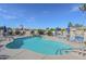 Inviting community pool with lounge chairs and umbrellas at 1861 E Birch St, Casa Grande, AZ 85122