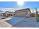 Single-story home with a two-car garage and front yard landscaping at 1861 E Birch St, Casa Grande, AZ 85122