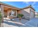 House exterior featuring a two-car garage and walkway at 1861 E Birch St, Casa Grande, AZ 85122