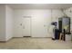 Spacious garage with ample storage space and water softener at 1861 E Birch St, Casa Grande, AZ 85122