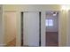 Hallway with double sliding doors to closet and bedroom at 1861 E Birch St, Casa Grande, AZ 85122