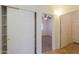 Hallway with double sliding doors to closet and bedroom at 1861 E Birch St, Casa Grande, AZ 85122