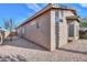 Tan house exterior with stone landscaping at 1861 E Birch St, Casa Grande, AZ 85122