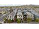 Aerial view of house and surrounding neighborhood with mountain views at 1926 W Lariat Ln, Phoenix, AZ 85085