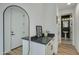 Clean hallway with a large mirror and view into a bathroom at 1926 W Lariat Ln, Phoenix, AZ 85085