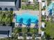 Resort-style pool with surrounding lounge chairs and palm trees at 1926 W Lariat Ln, Phoenix, AZ 85085