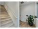 Modern staircase with carpeted steps and wooden handrail at 1926 W Lariat Ln, Phoenix, AZ 85085