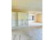 Living room with built-in shelving and window at 19462 N Star Ridge Dr, Sun City West, AZ 85375