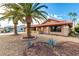 Single-story home with desert landscaping and a red tile roof at 19606 N Trail Ridge Dr, Sun City West, AZ 85375