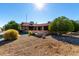 Landscaped front yard with gravel and mature trees at 19606 N Trail Ridge Dr, Sun City West, AZ 85375