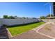 Landscaped backyard with a walkway at 2003 E Magdalena Dr, Tempe, AZ 85283