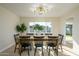 Bright dining room featuring a farmhouse table and chairs at 2003 E Magdalena Dr, Tempe, AZ 85283