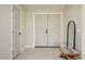 Entryway with tile floor, bench, and mirror at 2003 E Magdalena Dr, Tempe, AZ 85283