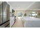 Modern kitchen with stainless steel appliances and white cabinetry at 2003 E Magdalena Dr, Tempe, AZ 85283