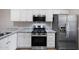 Modern kitchen with stainless steel appliances and granite countertops at 205 N 74Th St # 122, Mesa, AZ 85207