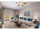 Bright living room with comfy seating and patio access at 205 N 74Th St # 122, Mesa, AZ 85207