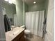 Bathroom featuring tile flooring, shower, and vanity at 21280 N 262Nd Dr, Buckeye, AZ 85396