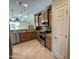 Spacious kitchen featuring stainless steel appliances, wooden cabinets, and granite countertops at 21280 N 262Nd Dr, Buckeye, AZ 85396