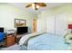 Charming bedroom with ceiling fan and large closet at 21280 N 262Nd Dr, Buckeye, AZ 85396