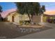 Single story home with landscaped front yard at 21280 N 262Nd Dr, Buckeye, AZ 85396