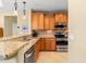 Modern kitchen with stainless steel appliances and granite countertops at 21280 N 262Nd Dr, Buckeye, AZ 85396