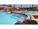 Resort-style pool with waterfall feature and multiple spas at 21280 N 262Nd Dr, Buckeye, AZ 85396