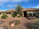 Single story home with desert landscaping at 21413 N 159Th Dr, Sun City West, AZ 85375