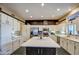 Kitchen with white cabinets and island at 21413 N 159Th Dr, Sun City West, AZ 85375